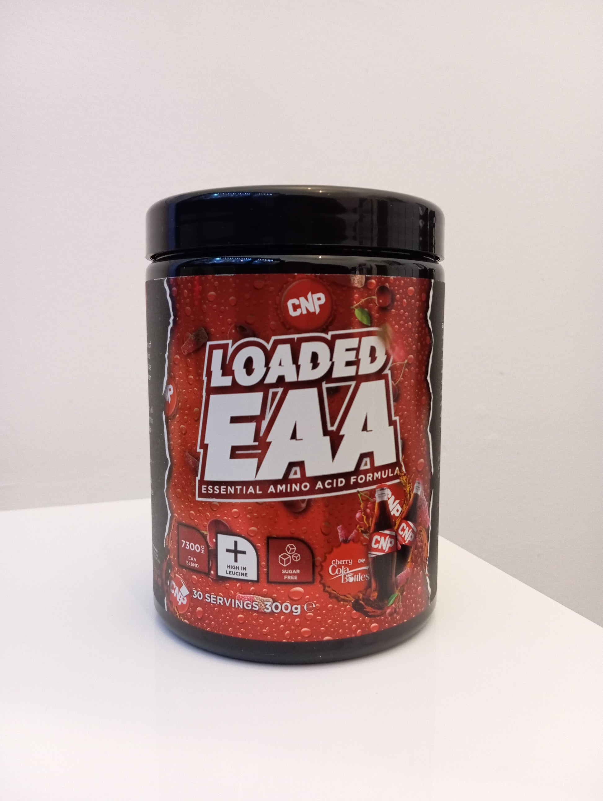 Container of Loaded EAA supplement on a white background